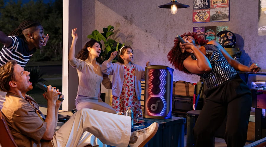 Friends hosting a karaoke house party